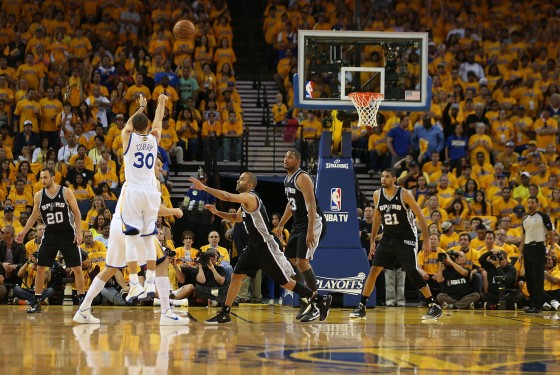 Steph splashing on the Spurs during Game Four [ (Photo by Jed Jacobsohn/Getty Images)]